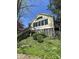 Beautiful home with a deck, screened porch, and well-maintained landscaping on a sunny day at 1915 Seaport Dr, Indianapolis, IN 46240