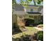 Charming home exterior featuring a well-manicured lawn and inviting front entrance at 1915 Seaport Dr, Indianapolis, IN 46240