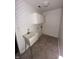 Functional laundry room with a utility sink and cabinet storage at 1915 Seaport Dr, Indianapolis, IN 46240