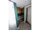Home office with a built-in desk and wooden cabinetry at 1915 Seaport Dr, Indianapolis, IN 46240