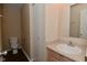 Functional bathroom with a vanity sink and a standard toilet, providing a practical and clean design at 1966 Freedom Ct, Greenfield, IN 46140