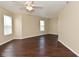 Spacious bedroom featuring a ceiling fan and ample natural light from multiple windows at 1966 Freedom Ct, Greenfield, IN 46140