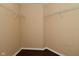 A neutral-toned closet with wood flooring and wire shelving at 1966 Freedom Ct, Greenfield, IN 46140