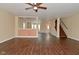 Inviting living room with hardwood floors, open layout, and seamless flow to other rooms, perfect for entertaining at 1966 Freedom Ct, Greenfield, IN 46140