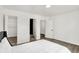 Bright bedroom with a large window, closet and ensuite bathroom at 213 S State Ave, Indianapolis, IN 46201