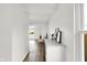 Bright entryway with white walls, hardwood floors, and modern decor at 213 S State Ave, Indianapolis, IN 46201