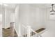 Hallway with modern lighting and staircase access at 213 S State Ave, Indianapolis, IN 46201