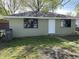 This backyard shot showcases the exterior of the building at 2141 Napoleon St, Indianapolis, IN 46203