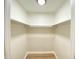 Walk in closet with new vinyl flooring and updated shelving at 2141 Napoleon St, Indianapolis, IN 46203