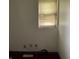 Empty bedroom with a window, wall plugs and baseboard at 2621 N Tacoma Ave, Indianapolis, IN 46218