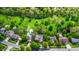 A captivating aerial view of homes with lush greenery and private pools in a tranquil neighborhood at 265 Monticello Dr, Greenwood, IN 46142