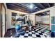 Finished basement with home gym and rec room featuring black and white flooring at 265 Monticello Dr, Greenwood, IN 46142