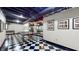 Finished basement with checkerboard floors, ping pong table, and wall decor at 265 Monticello Dr, Greenwood, IN 46142