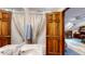 Well-lit bathroom featuring decorative drapes and a view to the home office area at 265 Monticello Dr, Greenwood, IN 46142