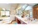 Luxurious bathroom featuring a skylight, double vanity, and walk-in shower at 265 Monticello Dr, Greenwood, IN 46142