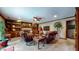 Inviting living room featuring a stone fireplace, wood accents, and cozy seating at 265 Monticello Dr, Greenwood, IN 46142