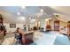 Spacious home office filled with bookshelves, desks, and lots of natural light at 265 Monticello Dr, Greenwood, IN 46142