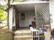 Back porch that requires clearing out of clutter at 3049 S Rybolt Ave, Indianapolis, IN 46241