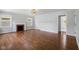 Bright living room with fireplace, hardwood floors, and ample natural light at 311 Duffey St, Plainfield, IN 46168