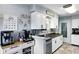 Bright kitchen with ample counter space, stylish decor, and stainless steel appliances at 349 Clark Ave, Beech Grove, IN 46107