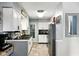 Clean kitchen with white cabinets, modern appliances, and stylish countertops at 349 Clark Ave, Beech Grove, IN 46107