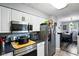 Functional kitchen with modern appliances, plenty of counter space, and easy access to the dining area at 349 Clark Ave, Beech Grove, IN 46107