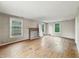 Spacious living room featuring hardwood floors, and natural light, showing great potential at 3516 Janet Dr, Indianapolis, IN 46218