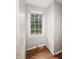 Bright room featuring a window with a view of trees and natural light at 3516 Janet Dr, Indianapolis, IN 46218
