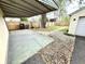 The fenced backyard has a detached garage, driveway, and mature tree at 417 S Oakland Ave, Indianapolis, IN 46201