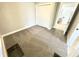 Comfortable bedroom featuring neutral walls, carpeting, and a spacious closet at 417 S Oakland Ave, Indianapolis, IN 46201