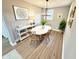 Cozy dining room features a white table, chairs, and stylish decor at 417 S Oakland Ave, Indianapolis, IN 46201