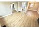 Cozy living room area featuring hardwood floors and access to other rooms at 417 S Oakland Ave, Indianapolis, IN 46201