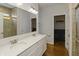 Bathroom with double sink vanity, hard surface countertops, and glass enclosed shower at 4324 Homestead Dr, Whitestown, IN 46075