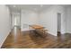 Dining area features wood floors and natural light at 4324 Homestead Dr, Whitestown, IN 46075
