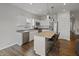 Bright kitchen with an island and modern stainless steel appliances at 4324 Homestead Dr, Whitestown, IN 46075