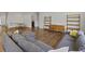Living room features L-shaped sofa, hardwood floors, and lots of natural light at 4324 Homestead Dr, Whitestown, IN 46075