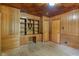 Office space with built-in shelving and cabinets and a wooden ceiling at 5648 Rolling Ridge Rd, Indianapolis, IN 46220