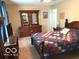 Comfortable bedroom featuring a dresser, ceiling fan, and a window for natural light, creating a relaxing space at 569 Meadow Dr, Danville, IN 46122