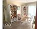 Cozy dining area with matching wooden chairs and natural light at 569 Meadow Dr, Danville, IN 46122