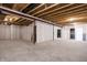 Large unfinished basement space with visible ceiling beams and a concrete floor ready for customization at 5770 Flagler Ln, Brownsburg, IN 46112