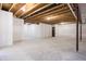 Unfinished basement with exposed beams, open layout, and potential for customization at 5770 Flagler Ln, Brownsburg, IN 46112