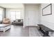Bright living room with hardwood floors, lots of natural light, and stylish decor at 5770 Flagler Ln, Brownsburg, IN 46112