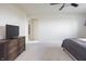 Spacious main bedroom with an ensuite entrance and a dark wood dresser at 5770 Flagler Ln, Brownsburg, IN 46112