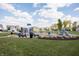A colorful playground with slides, climbing structures, and benches in a Gathering-friendly community setting at 5770 Flagler Ln, Brownsburg, IN 46112