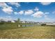 Peaceful community pond offering serene views and well-manicured lawns, surrounded by charming homes at 5770 Flagler Ln, Brownsburg, IN 46112
