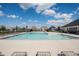 A refreshing swimming pool surrounded by lounge chairs, perfect for relaxing on sunny days at 5770 Flagler Ln, Brownsburg, IN 46112
