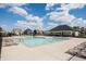 An inviting community pool area with plenty of lounge chairs for residents to enjoy the sunny weather at 5770 Flagler Ln, Brownsburg, IN 46112