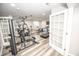 Finished basement gym features modern equipment and luxury vinyl plank flooring at 6064 Bartley Dr, Noblesville, IN 46062