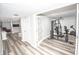 Finished basement gym with open layout and luxury vinyl plank flooring at 6064 Bartley Dr, Noblesville, IN 46062