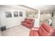 Carpeted Media Room with a bar area and reclining leather chairs at 6064 Bartley Dr, Noblesville, IN 46062
